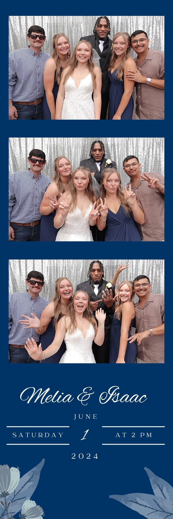 Wedding party posing in front of a blue wall with confetti and a "Mr. & Mrs." sign