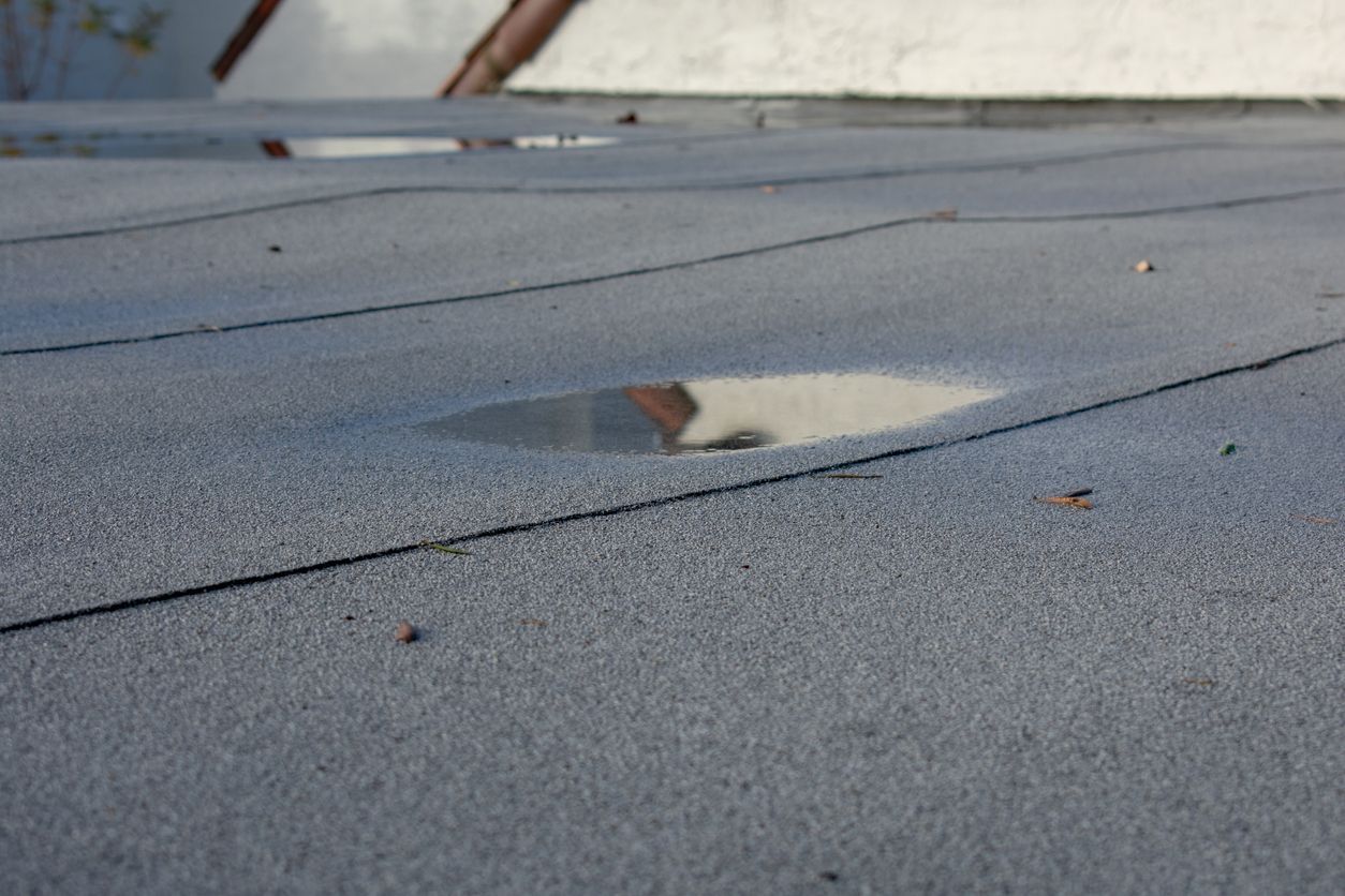 A close up of a roof with a hole in it.