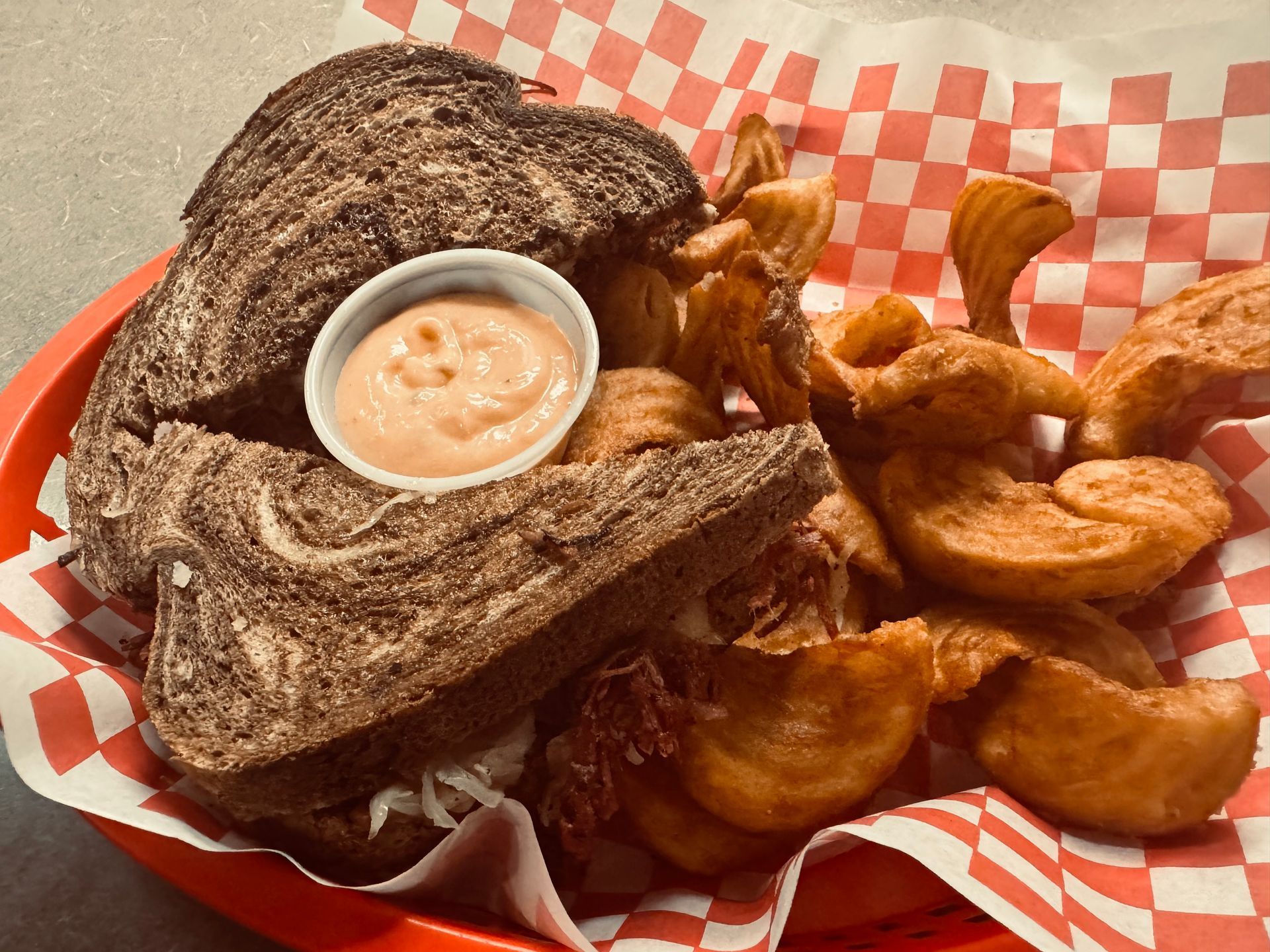 In house cooked corned beef on Marble Rye with a side of beer battered fries