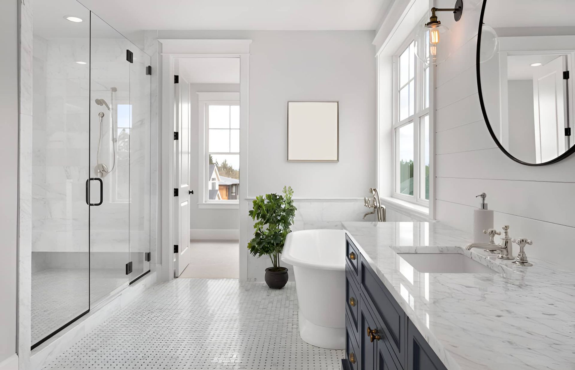 A Bathroom With A Bathtub , Sink , Shower And Mirror — Gillen Plumbing In Ciccone, NT