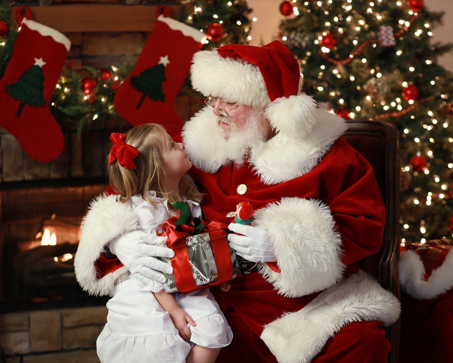 Santa giving girl a gift