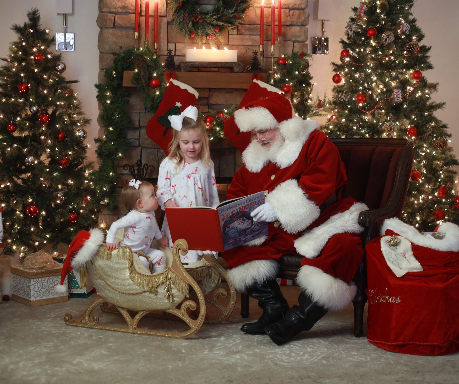 Santa reading a book to children