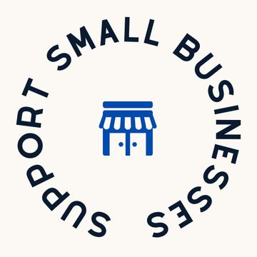 Un letrero que dice: "Comprar a pequeña escala y apoyar lo local es el regalo que no se acaba nunca".