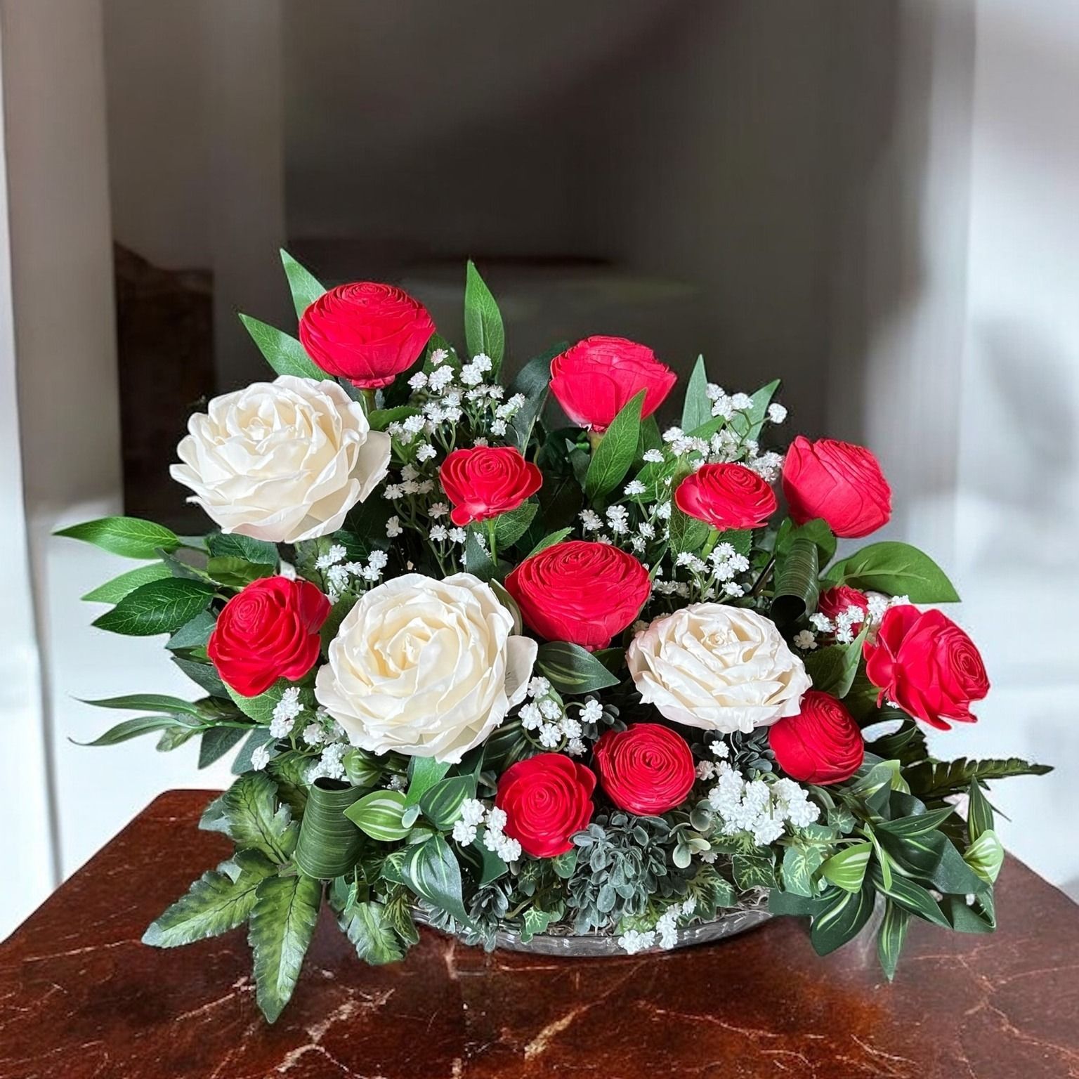wooden red and white rose arrangement