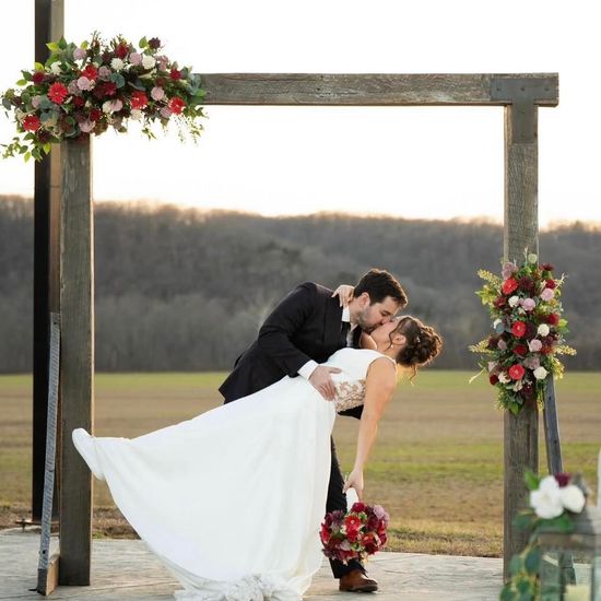 wooden floral altar arrangements for wedding