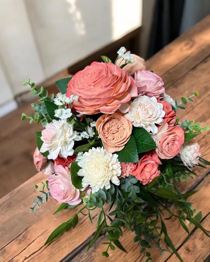 peach and white wooden flower arrangement