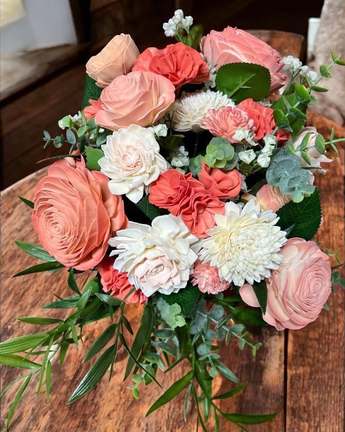 white and peach floral arrangement