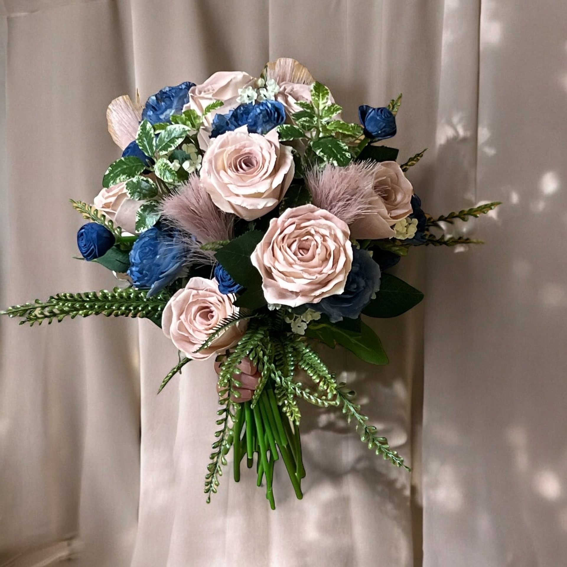 blue and pink wooden floral arrangement