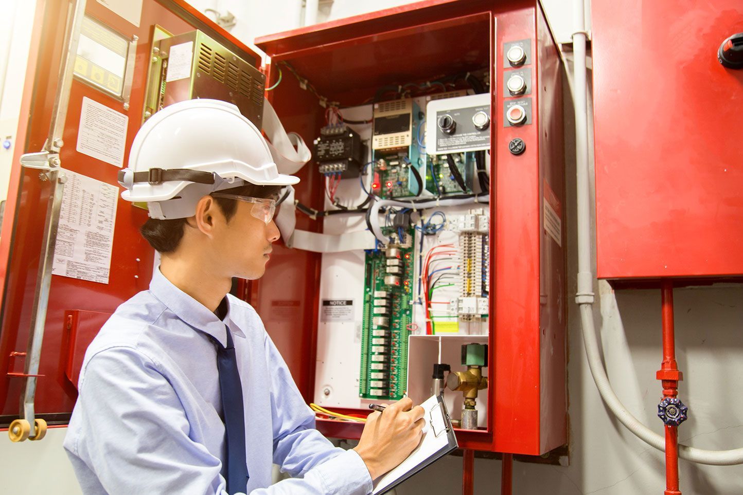 Engineer Checking Circuit Board
