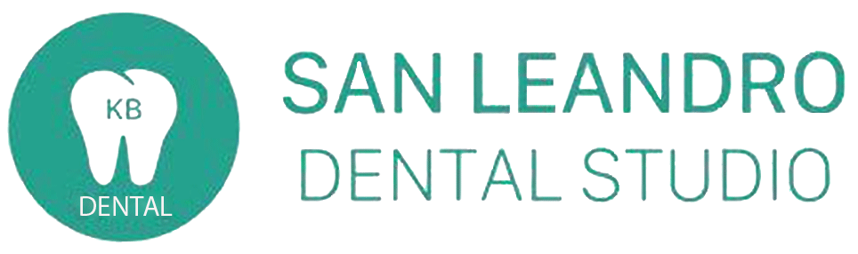 The logo for san leandro dental studio shows a tooth in a circle.