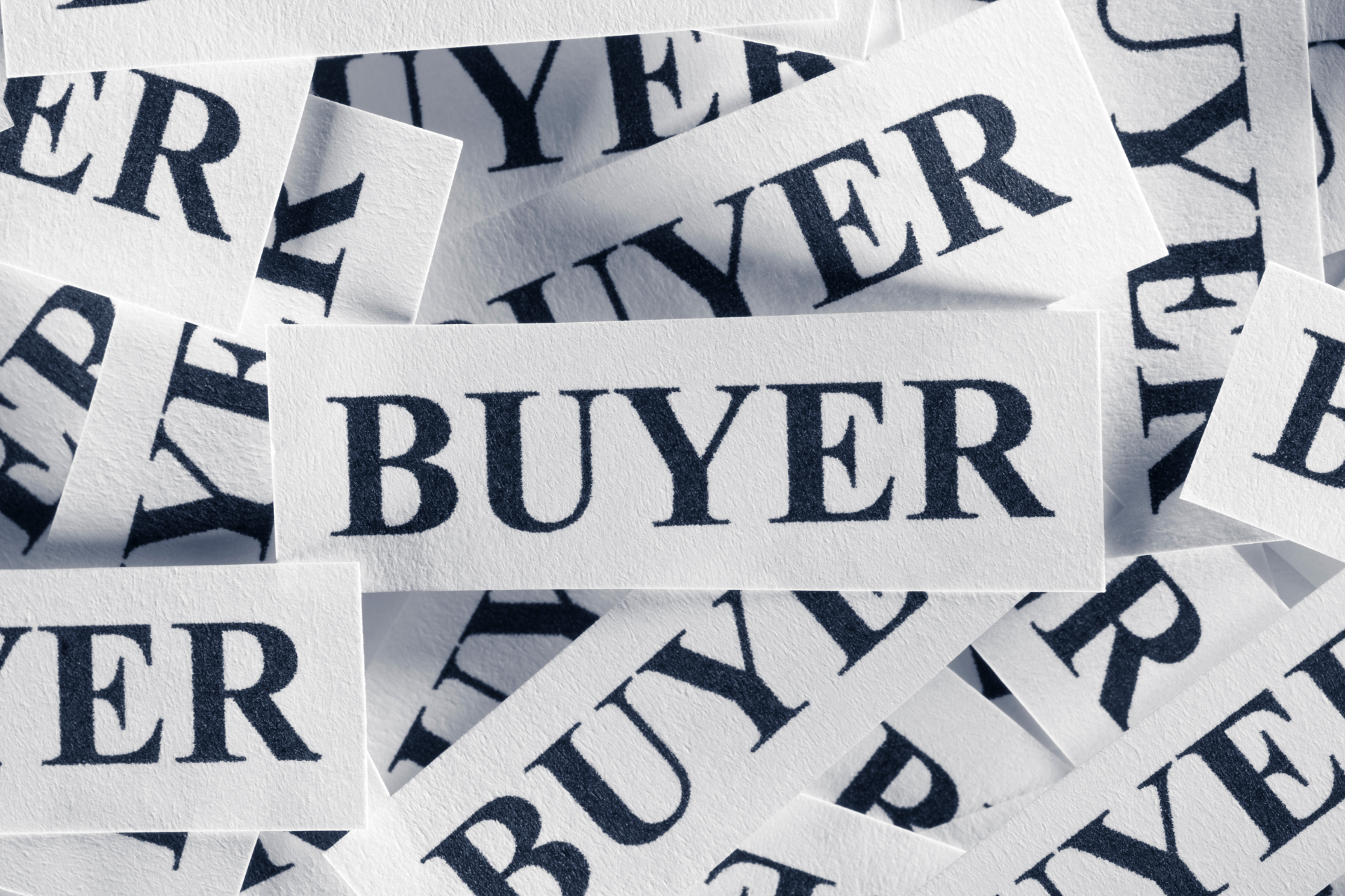 a bunch of papers with the word buyer on them