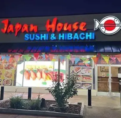 Colored logo of Japan House with torii gate and water color background.