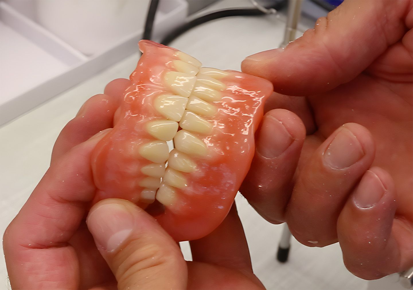 Close-Up Of A Full Set Of Dentures
