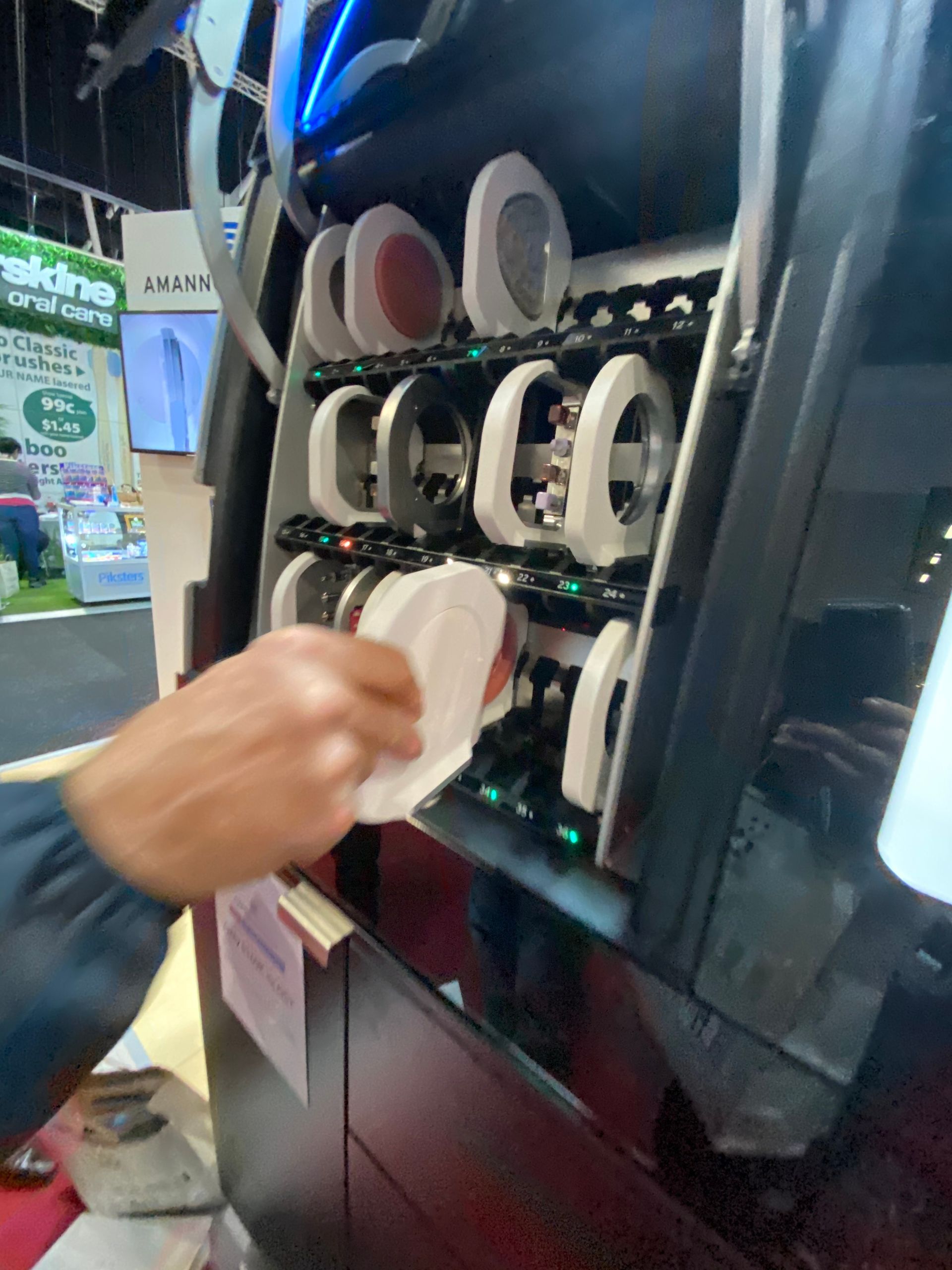 Person Taking a Dental Mold From a Machine — My Denture Clinic in Gold Coast, QLD
