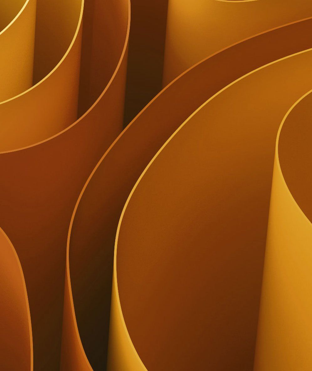 Abstract orange and gold curved paper layers forming a geometric pattern