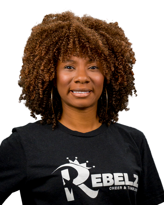 A woman wearing a black shirt with the letter r on it