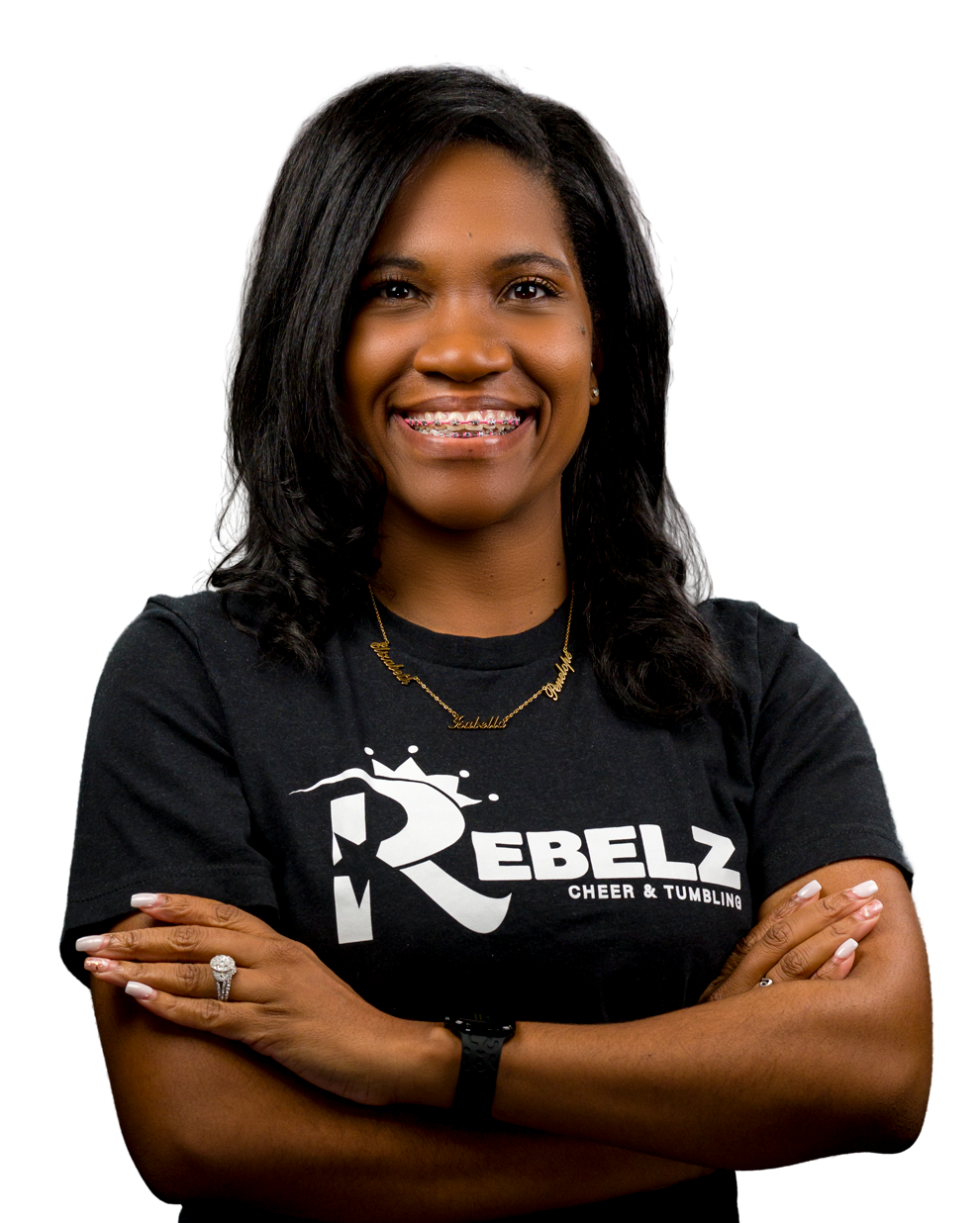 A woman wearing a black shirt with the letter r on it