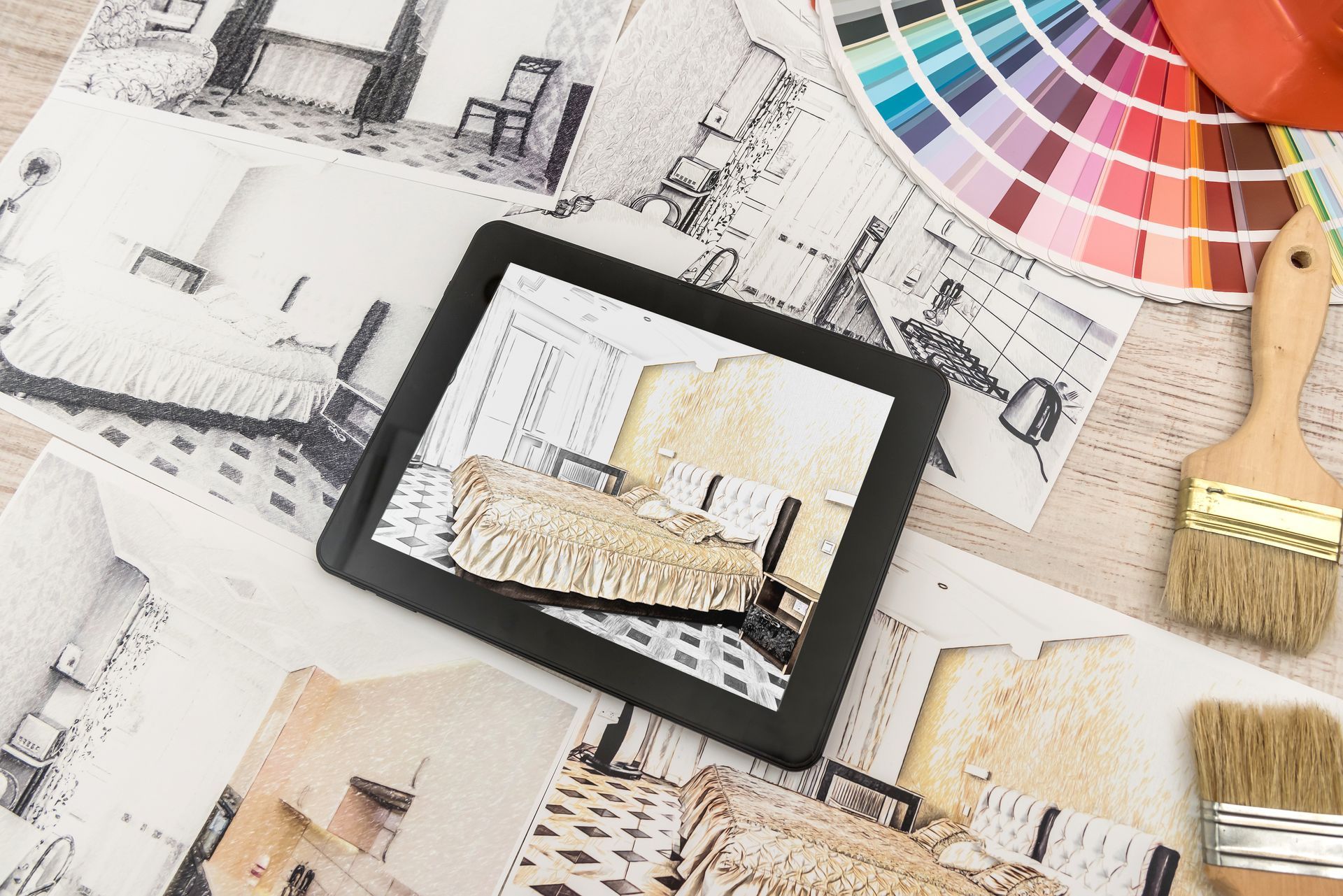 Tablet showing bedroom plans in finished room. Modern apartment. Tablet showing bedroom plans in finished room. Modern apartment.