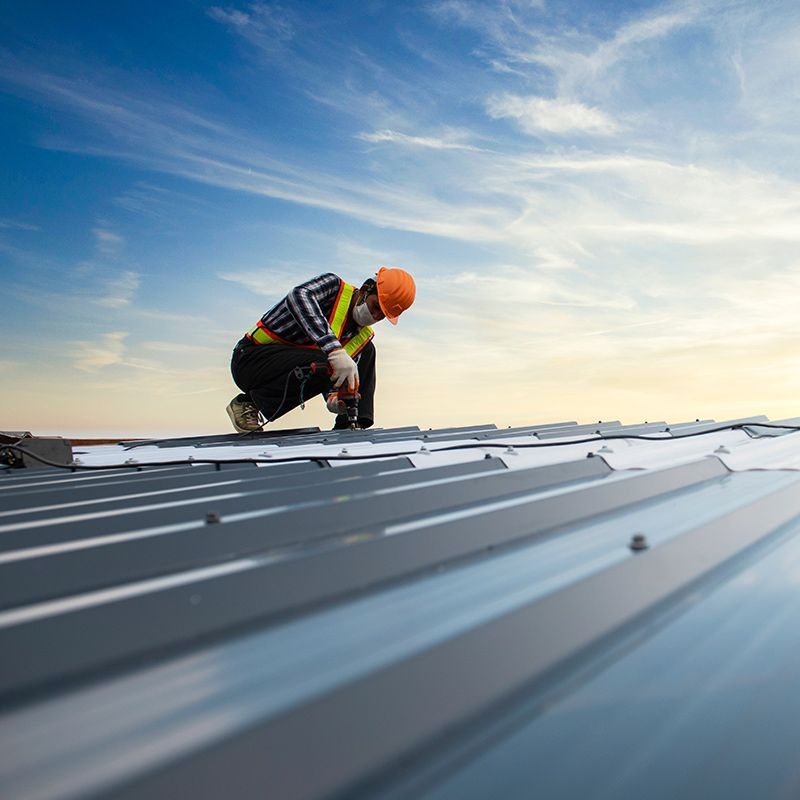 Worker Doing Commercial Roofing
