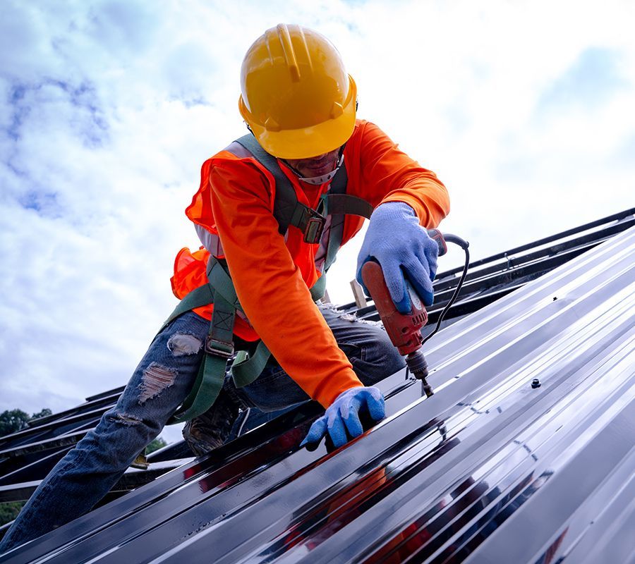 Man Installing Metal Roof