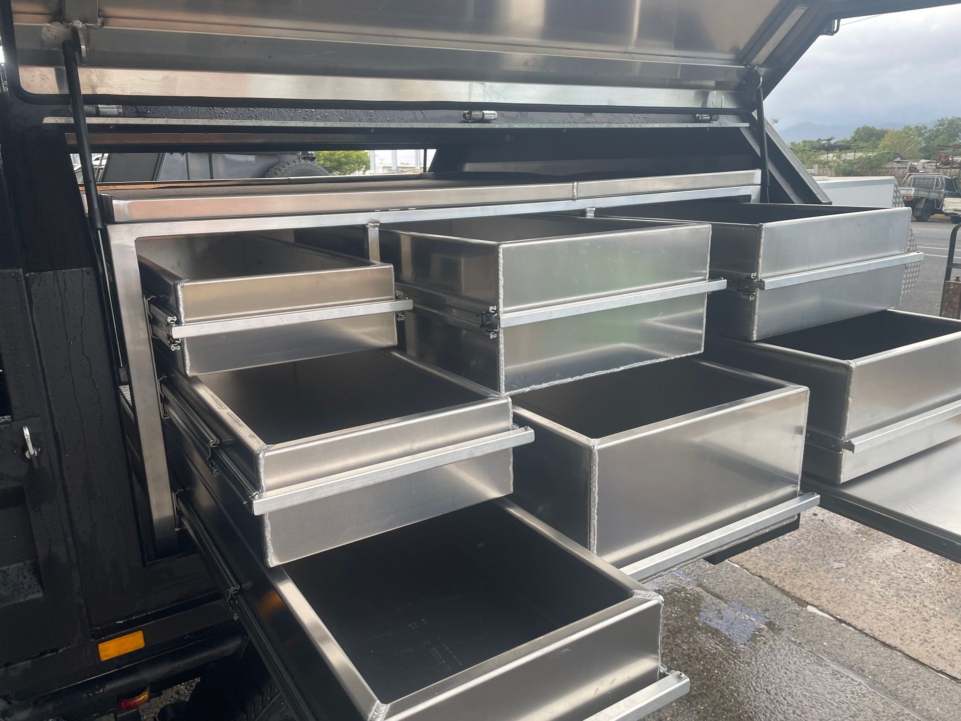 Aluminum truck bed drawers, open, stacked, and ready for tool storage.— Boyd's Fabrications In Portsmith, QLD 