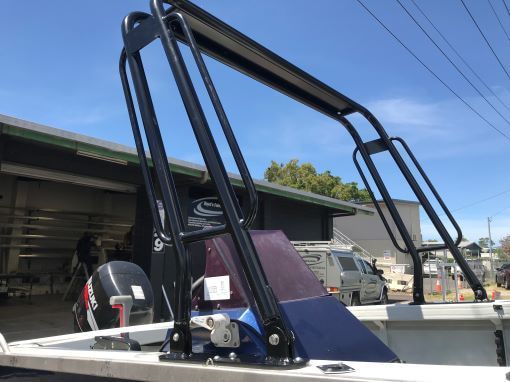 A Boat is Parked in Front of a Building — Boyd's Fabrications In Smithfield, QLD