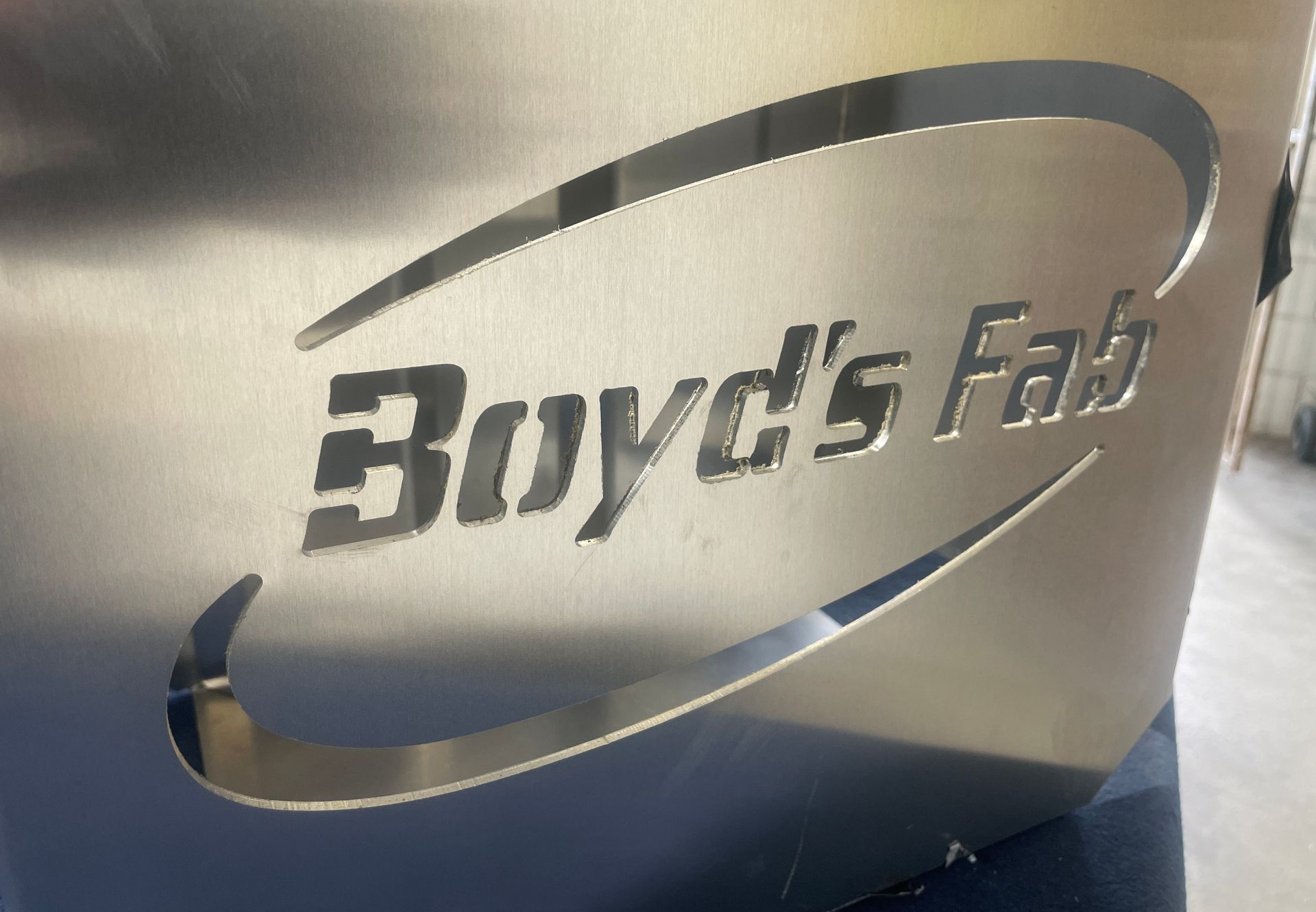 Cnc Router Cutting Wood, Dust and Shavings Visible — Boyd's Fabrications In Gordonvale, QLD