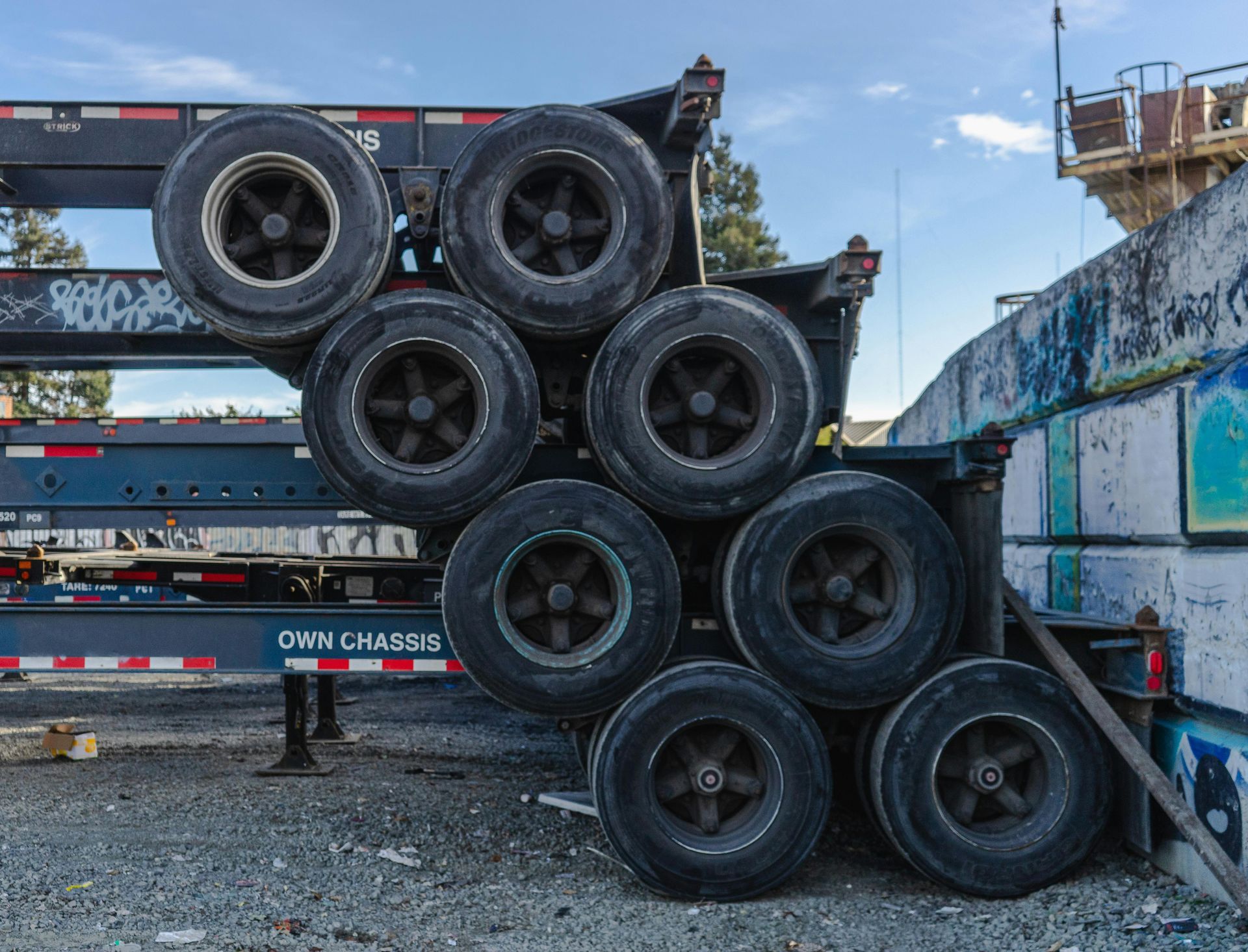 A bunch of tires are stacked on top of each other