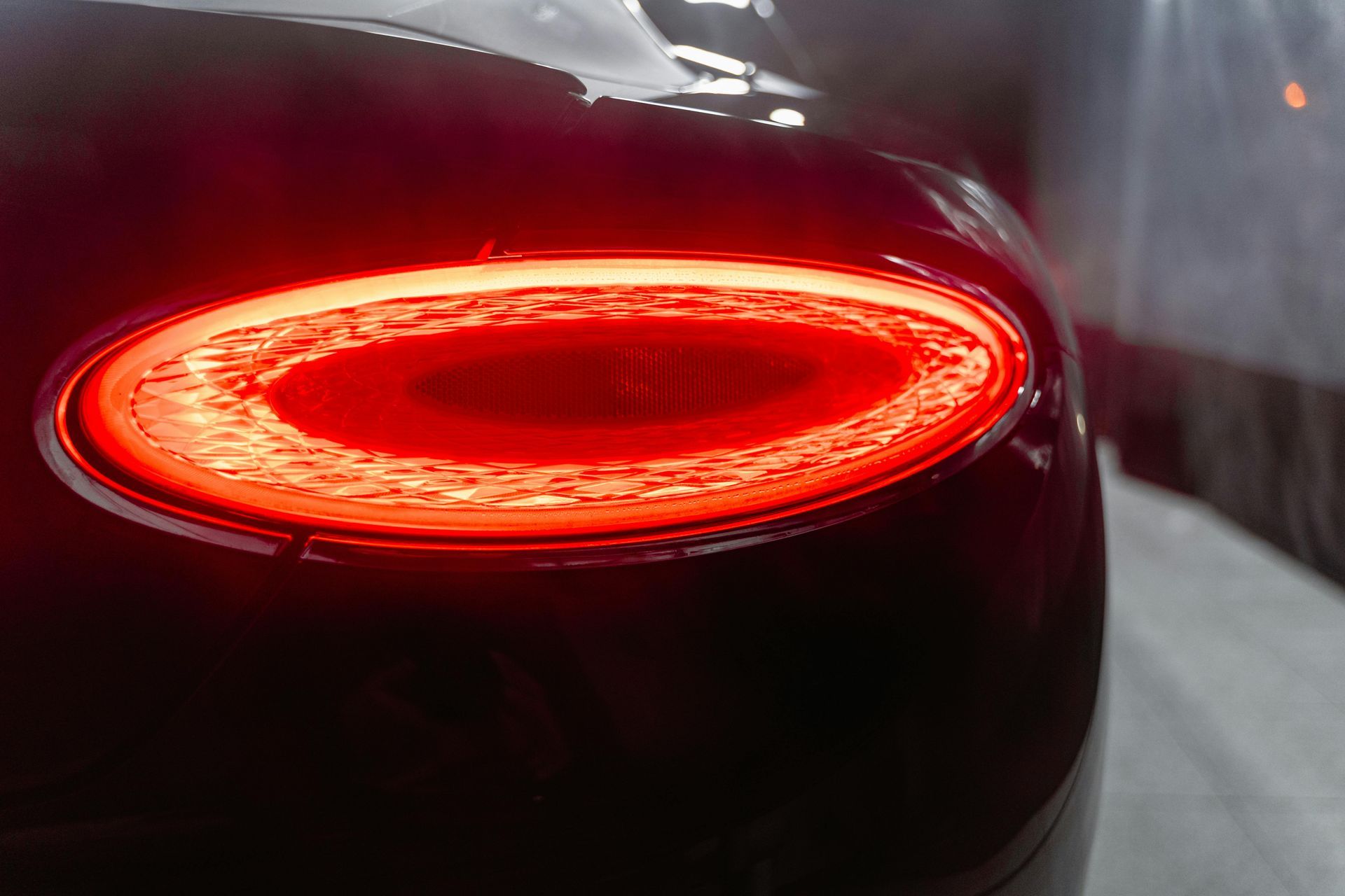 A close up of a car 's tail light.