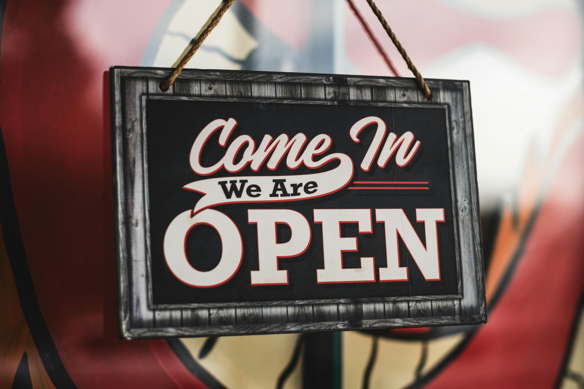 We're Open Sign on a business door