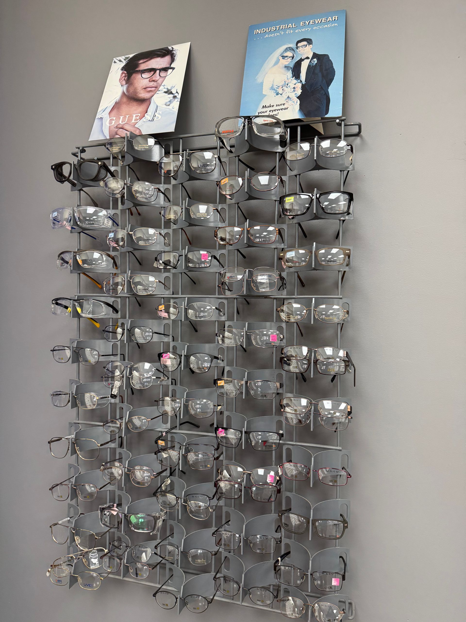 A display case filled with many different types of glasses