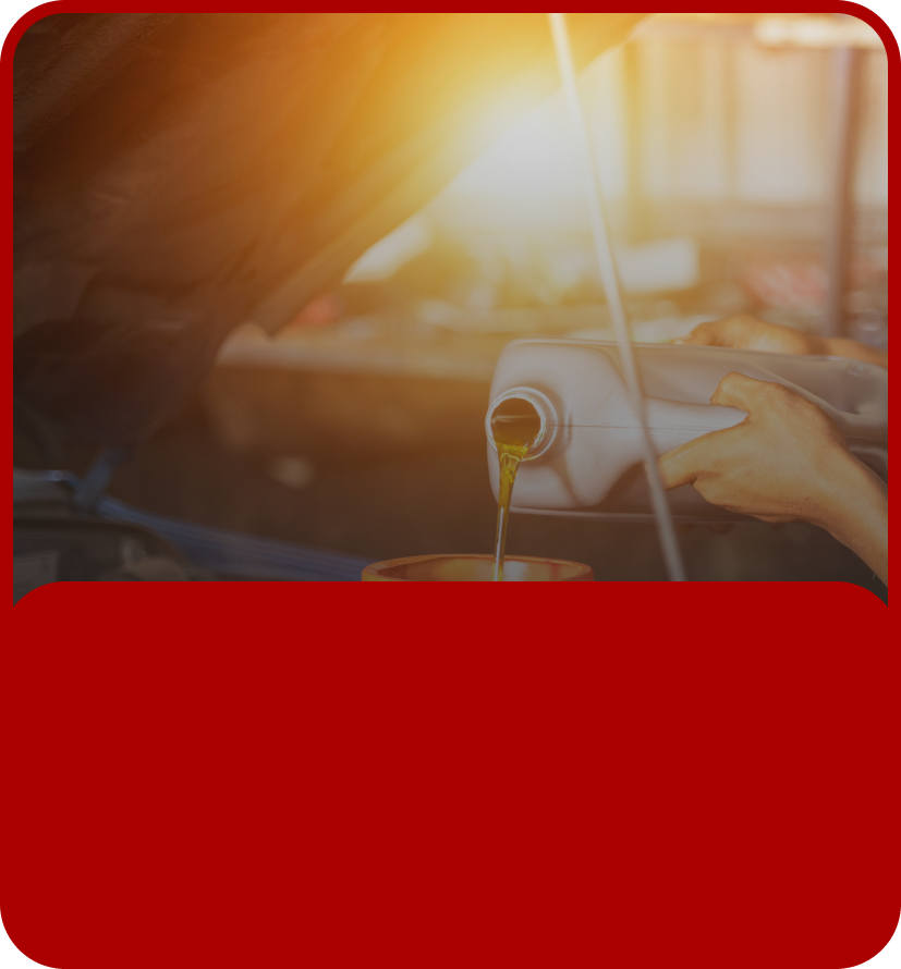 Wine being poured into a glass in warm sunlight, with a red banner below. | JB Auto Works
