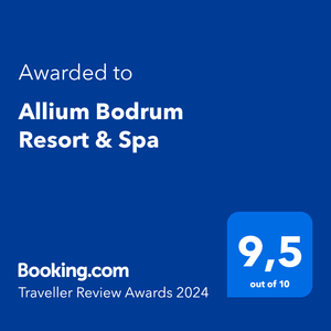 A blue sign that says `` awarded to allium bodrum resort & spa ''