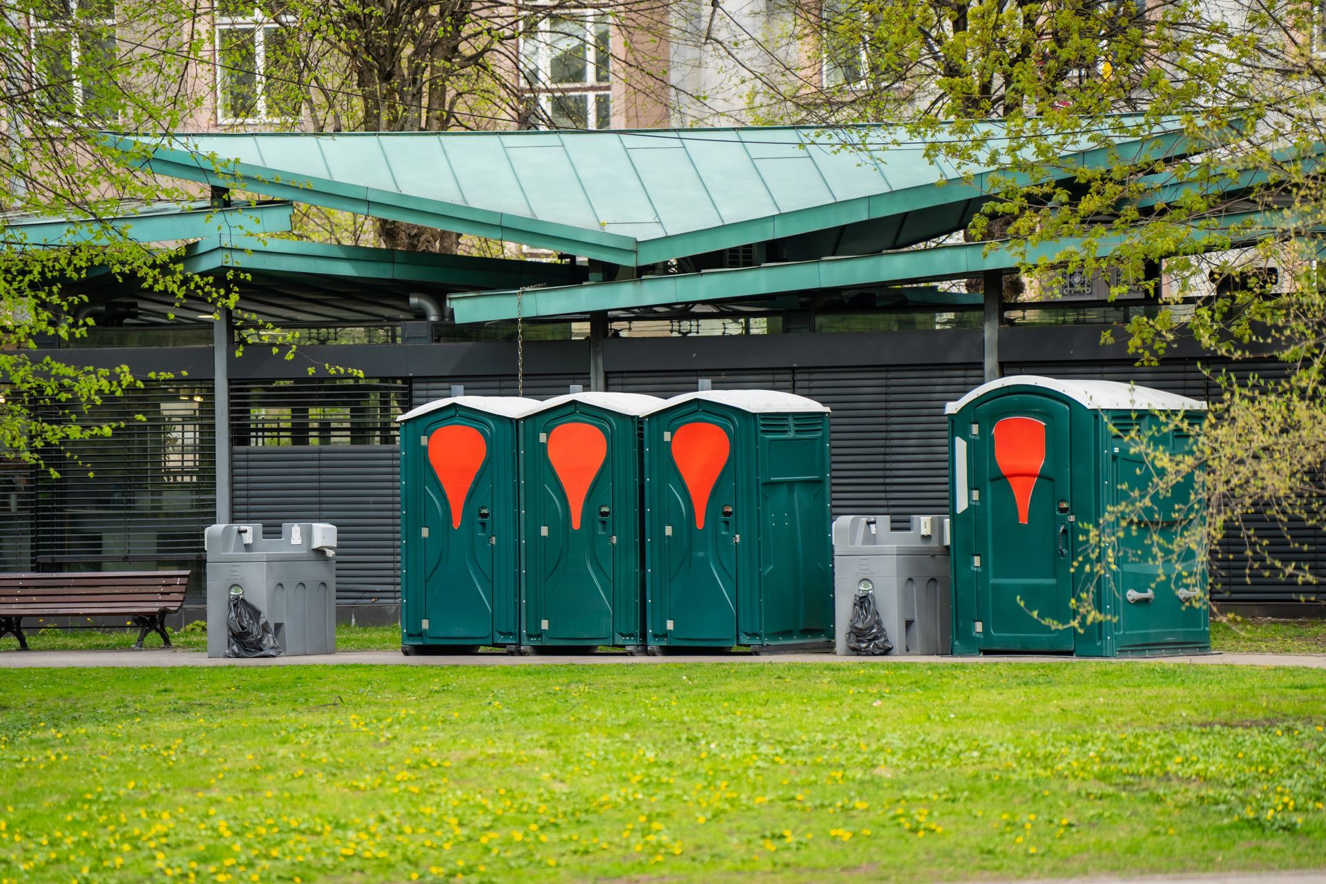 Portable restroom services units lined up and ready for rental. Portable restroom services units lined up and ready for rental.