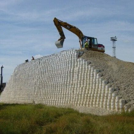 Earthen Revetment System for Retaining Walls