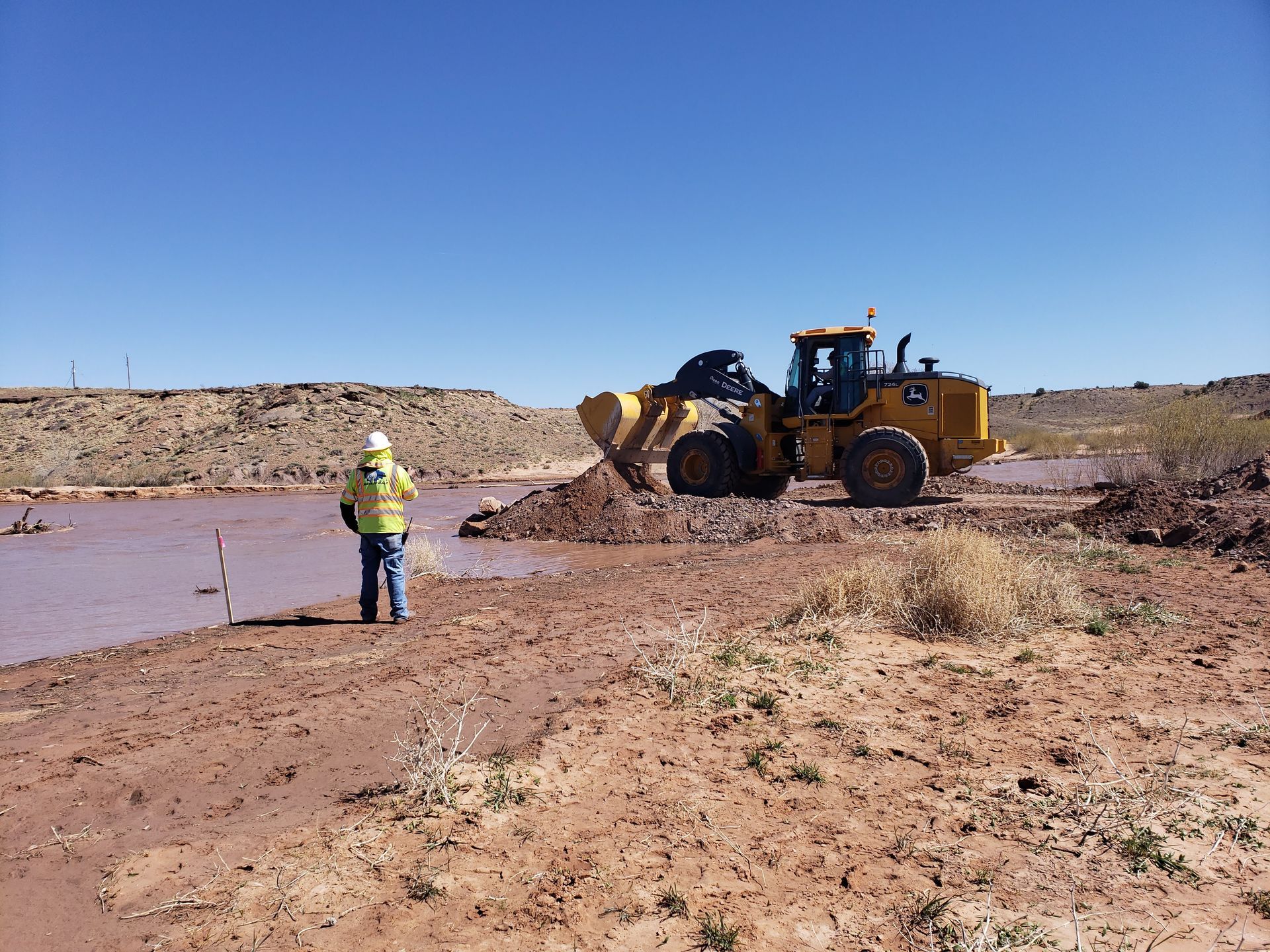 Attempts to push a levee across the river failed to stop floodwater over the course of 3 days