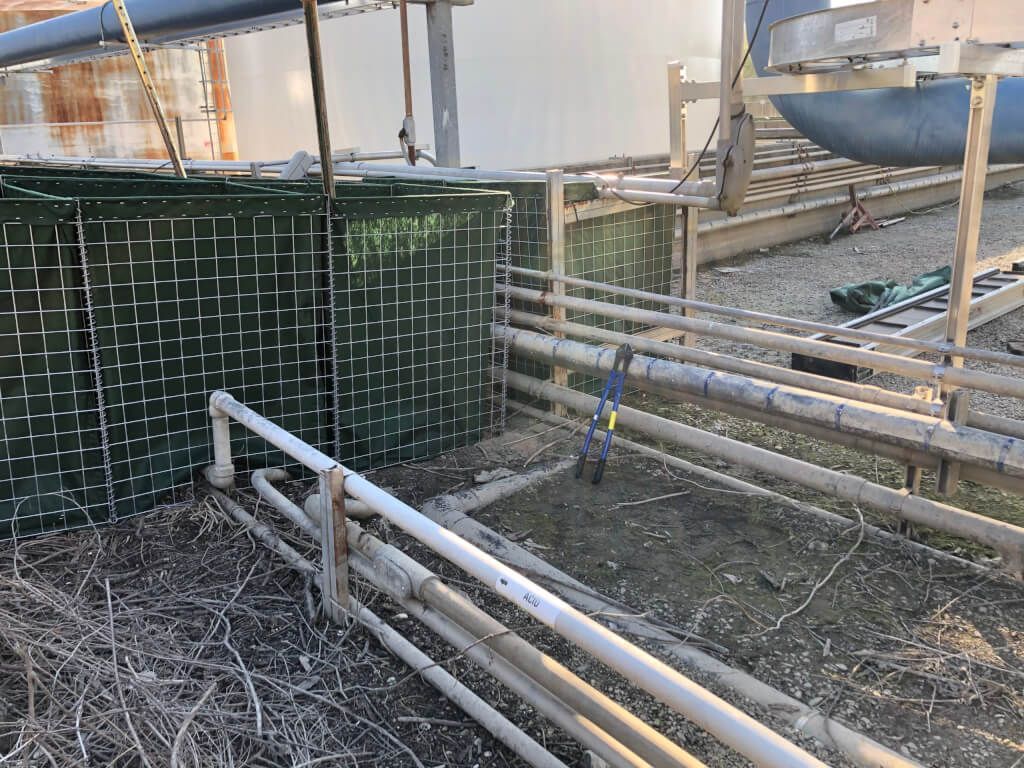 Flood Barrier Around Pipe Step 1 - HESCO Bastion