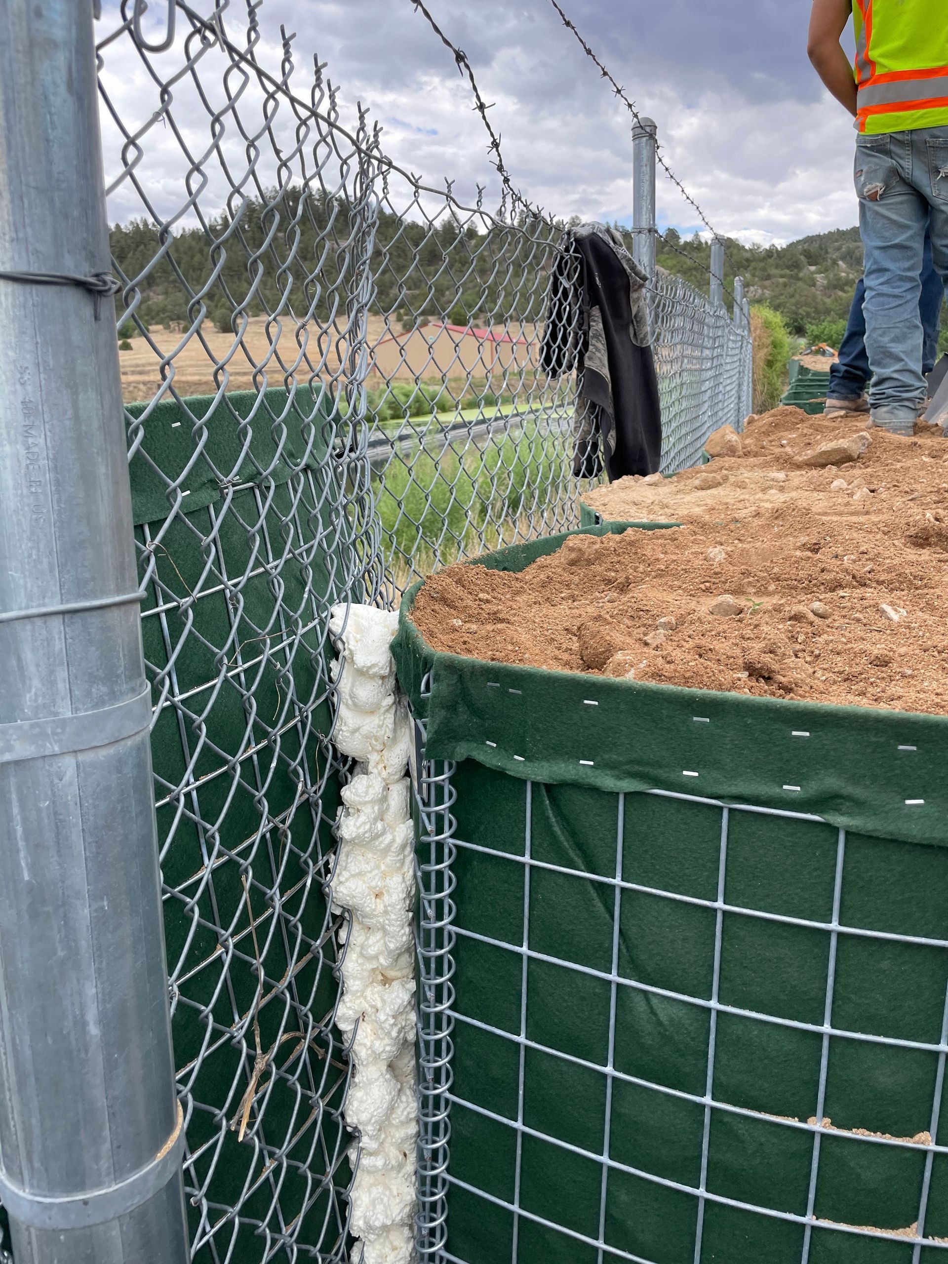 Spray foam effectively stops flooding from gaps within a flood wall