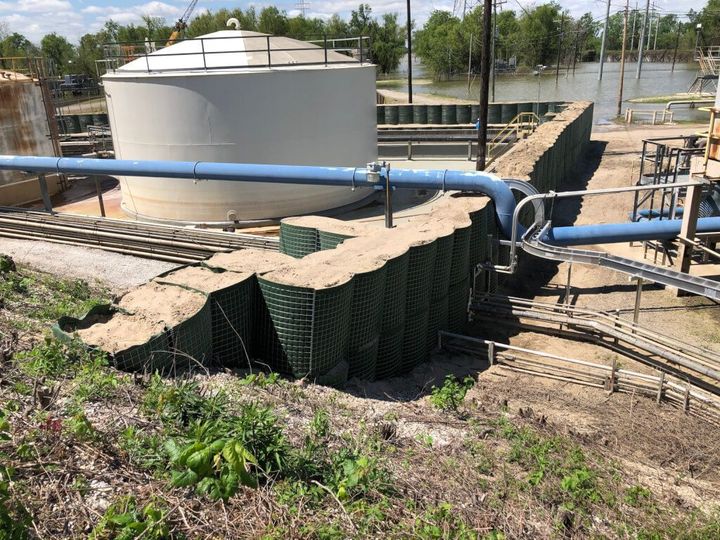 HESCO Flood Barriers provide secondary containment and flood protection around oil and gas pipes in Louisiana