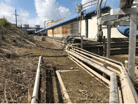 This shows the line of oil and gas pipes that we had to work around in creating a flood barrier around the facility