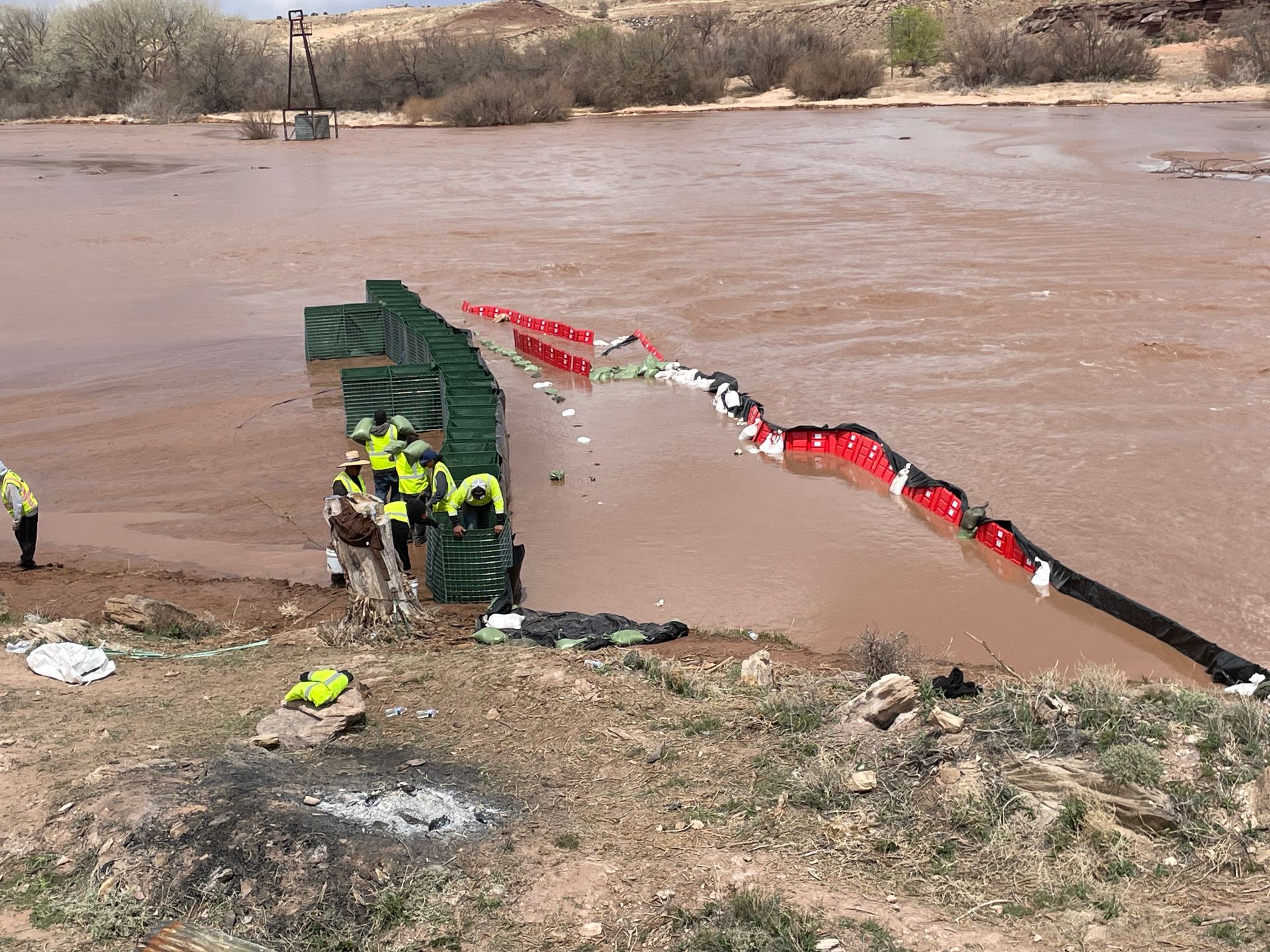 Once the NOAQ Boxwall flood barrier redirected the water, we were able to build the HESCO flood barrier behind it.