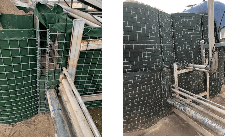 Step 3 - After securing the wire to the HESCO on either side of the pipes, the units are filled making sure the geotextile fabric gets a good seal around the pipes during the filling process