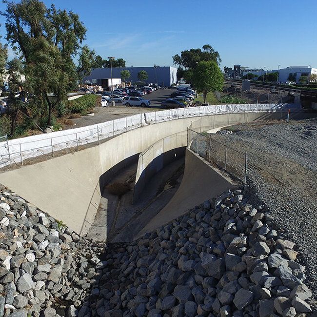 Muscle Wall Flood Barrier being used to protect overflowing rivers during flood season