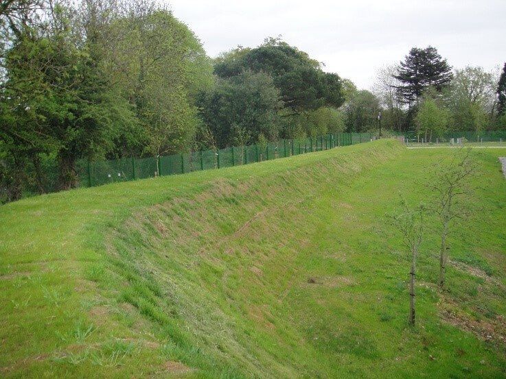 Flood barrier from flood defense landscaping - Reinforced Berm Vegetated