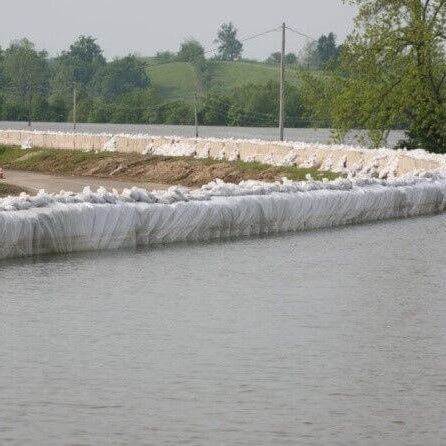 geogrid sandbag system that stops flooding and prevents erosion
