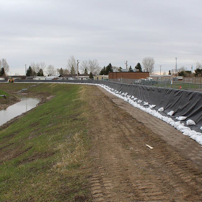 Muscle Wall flood barriers providing temporary flood protection.