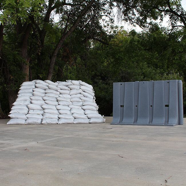 A single section of the 4' tall Muscle Wall flood barrier can replace hundreds of sandbags and hours of labor.