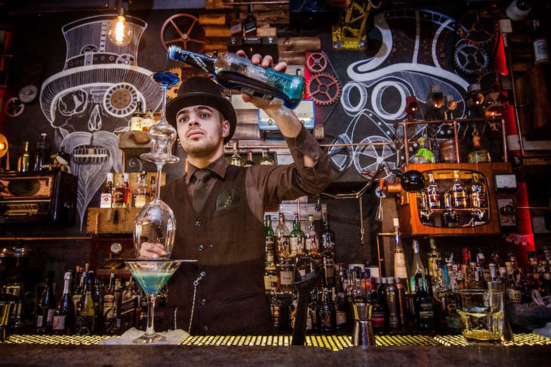 Quirky bar tender, making cocktails