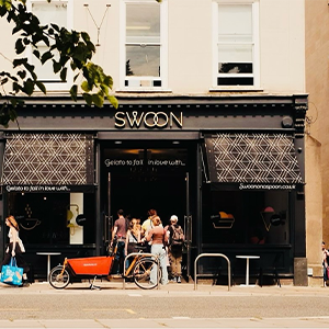 The exterior of a black storefront for 