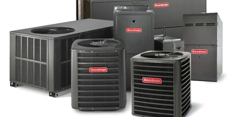 A collection of Goodman brand HVAC units of various sizes and shapes in a neutral setting.